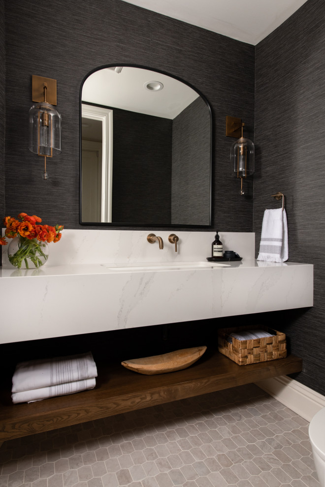 Inspiration for a small modern powder room in Orange County with open cabinets, black walls, porcelain floors, an undermount sink, engineered quartz benchtops, beige floor, white benchtops and a floating vanity.