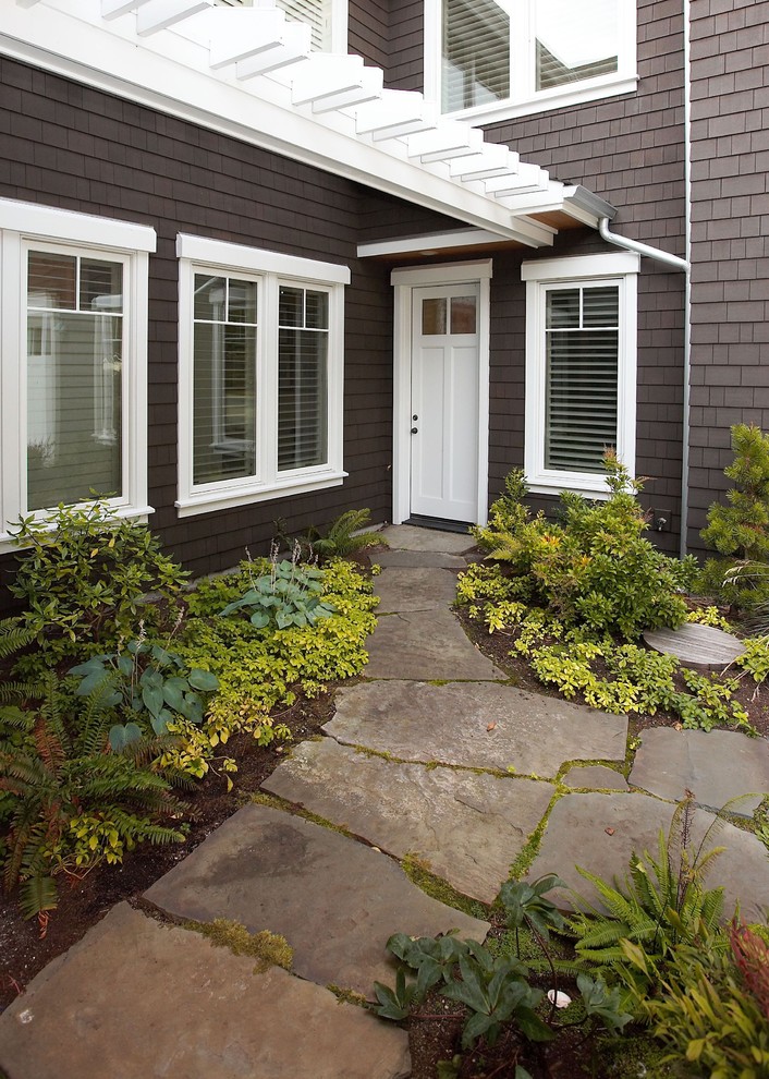Photo of a traditional entryway in Seattle with a single front door and a white front door.