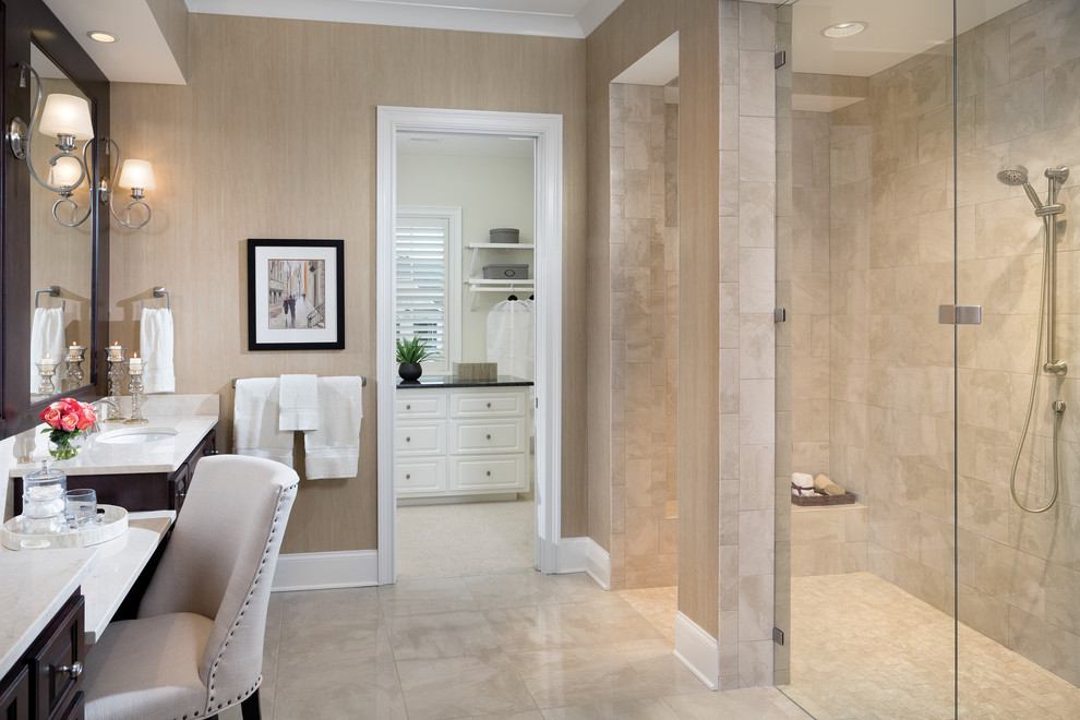 Inspiration for a large transitional master bathroom in Tampa with recessed-panel cabinets, dark wood cabinets, a freestanding tub, an open shower, a one-piece toilet, beige tile, ceramic tile, beige walls, ceramic floors, an undermount sink and onyx benchtops.