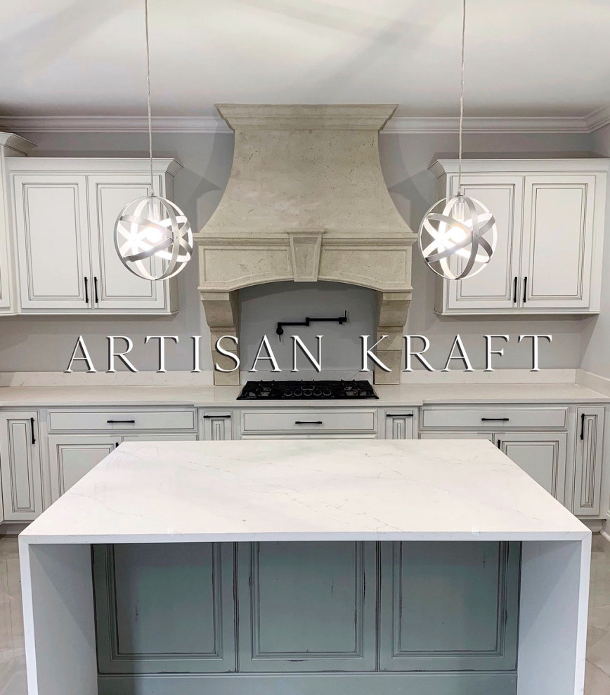 Design ideas for a mid-sized transitional u-shaped separate kitchen in Chicago with a farmhouse sink, raised-panel cabinets, white cabinets, marble benchtops, white splashback, marble splashback, black appliances, limestone floors, with island, beige floor, white benchtop and recessed.