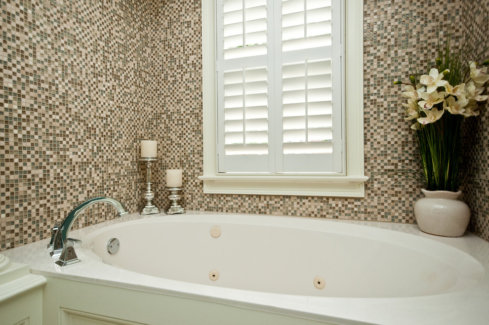 Drop-in bathtub - mid-sized transitional master drop-in bathtub idea with blue walls and a hinged shower door