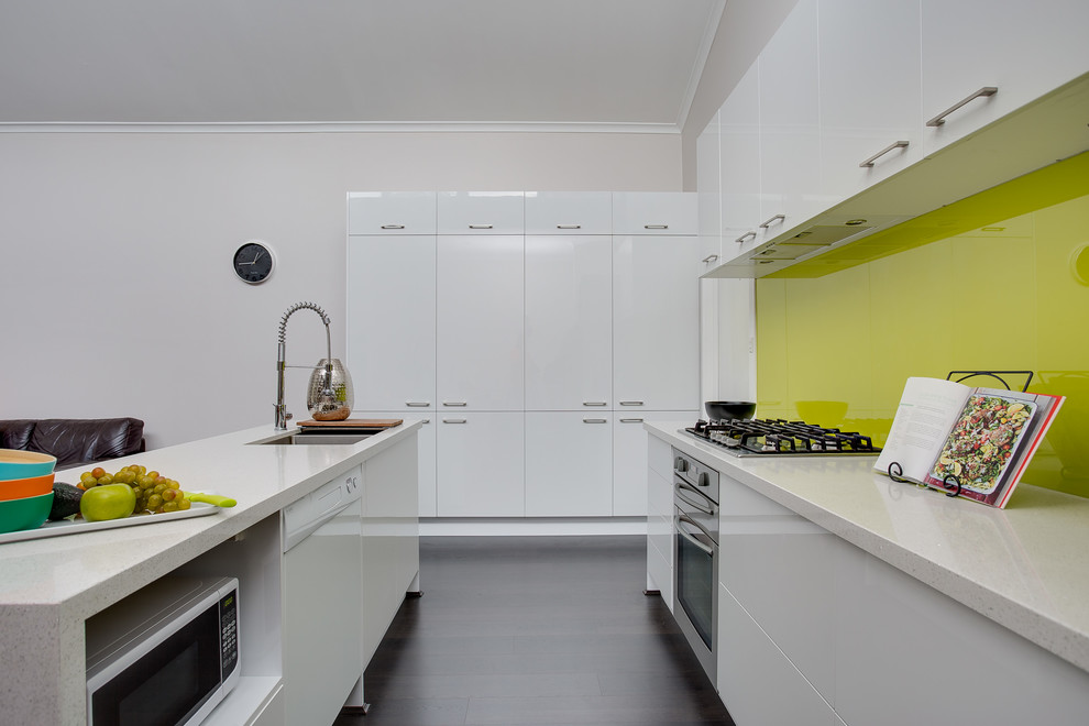 Traditional eat-in kitchen in Melbourne with open cabinets, white cabinets, quartz benchtops, glass sheet splashback, dark hardwood floors and with island.