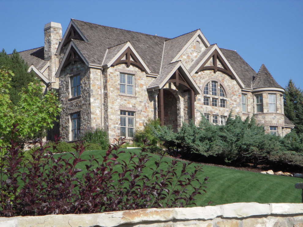 Design ideas for a traditional exterior in Salt Lake City with stone veneer.