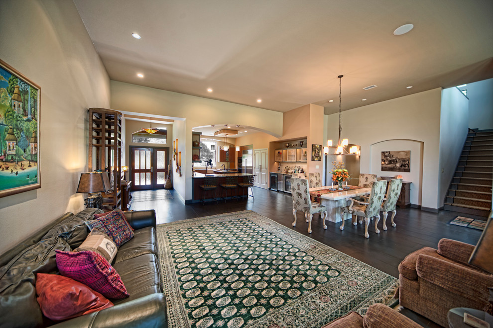 Large modern kitchen/dining combo in Austin with multi-coloured walls, ceramic floors, a two-sided fireplace and a tile fireplace surround.