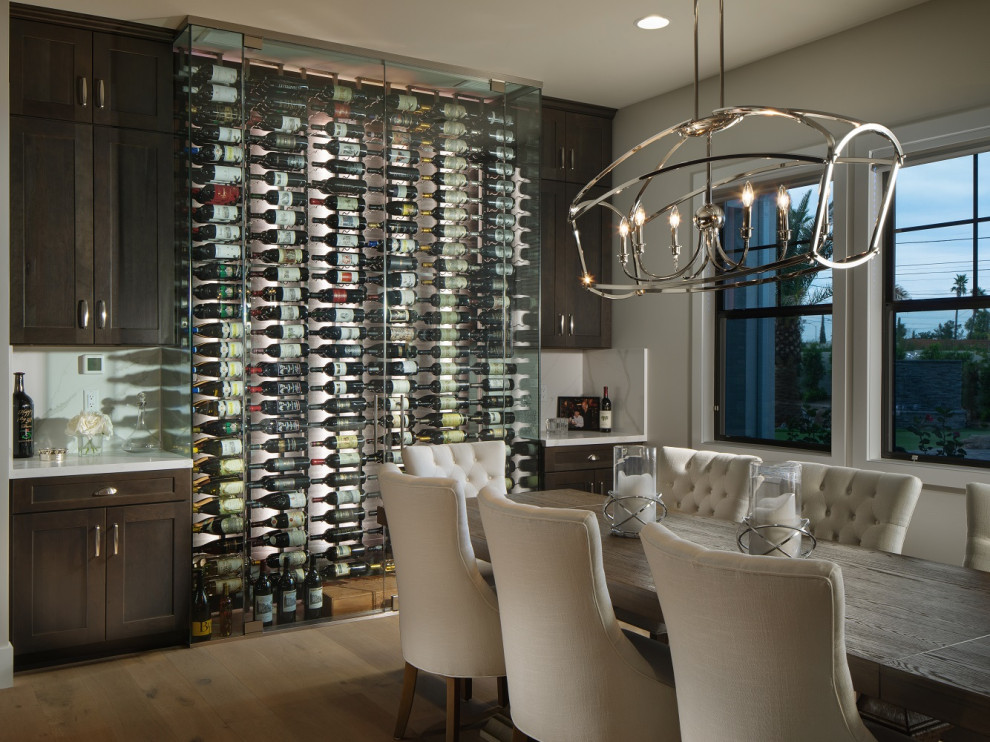 Inspiration for a medium sized modern wine cellar in Phoenix with ceramic flooring, storage racks and multi-coloured floors.