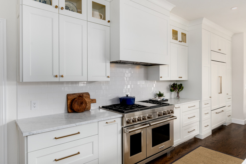 Example of a transitional kitchen design in Denver