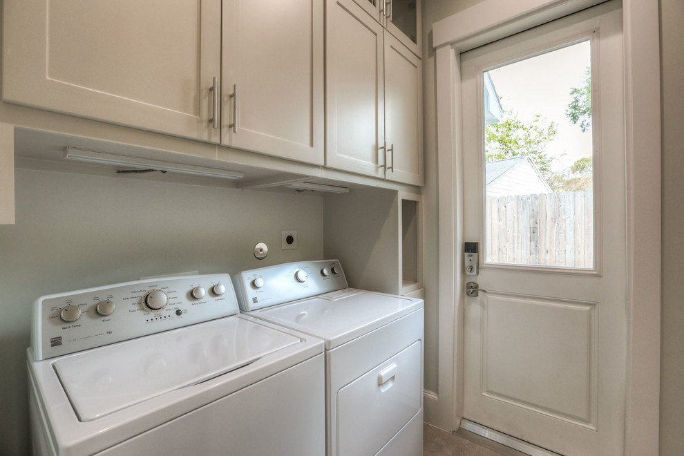 Mid-sized transitional l-shaped ceramic tile and beige floor dedicated laundry room photo in Houston with shaker cabinets, beige cabinets, a side-by-side washer/dryer, an undermount sink, granite countertops and white walls