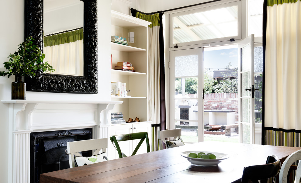 Design ideas for a transitional dining room in Melbourne.