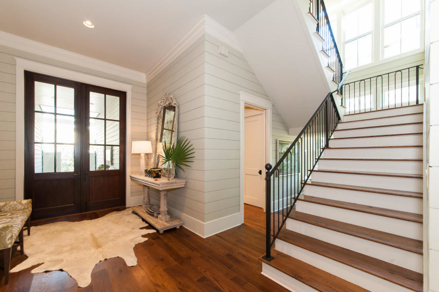 This is an example of a beach style entryway in Miami.