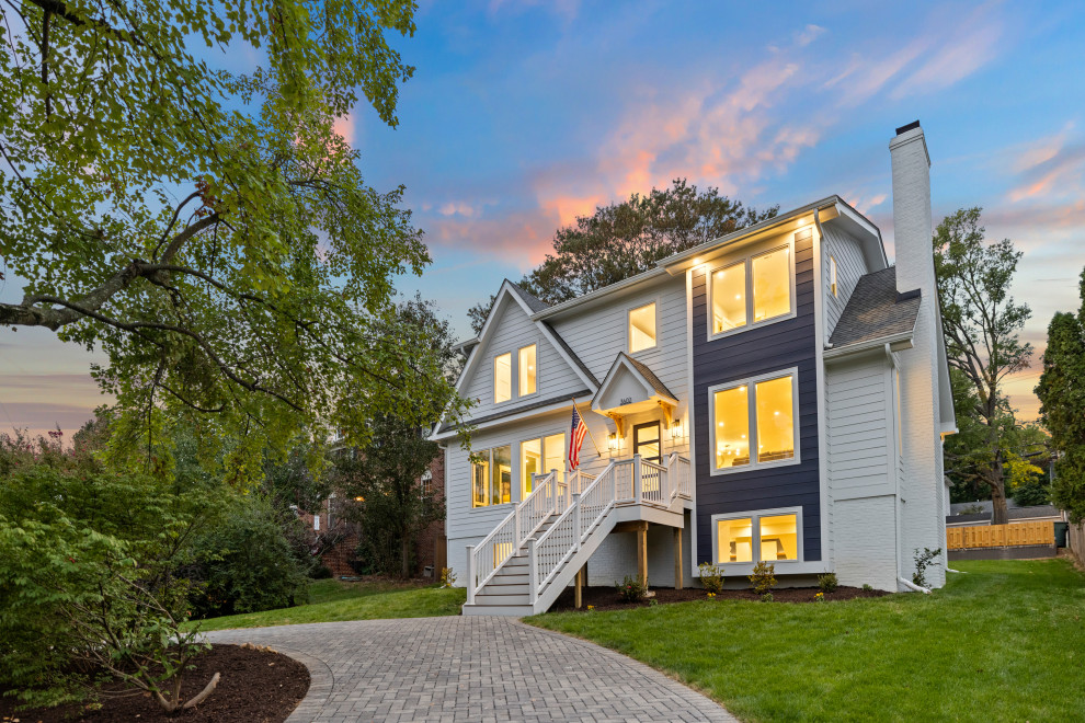 Inspiration for a large transitional white three-story exterior home remodel in DC Metro