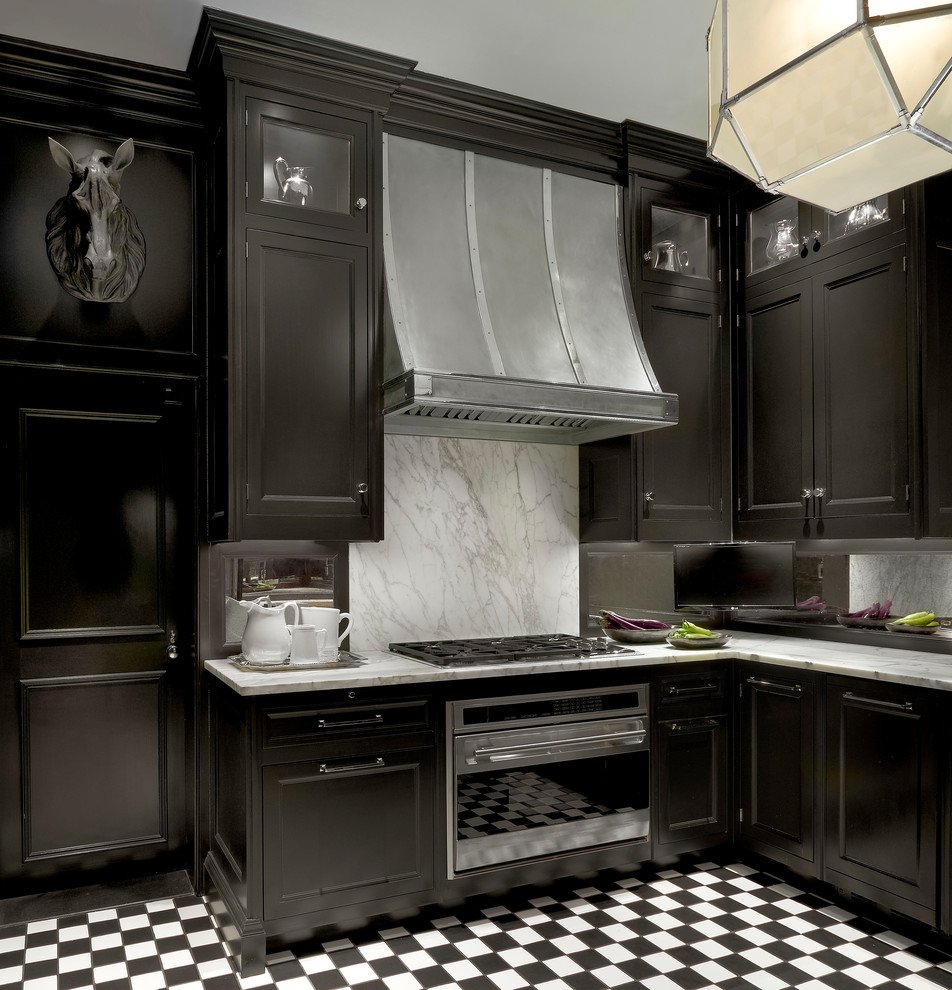 Inspiration for a small traditional separate kitchen in Chicago with black cabinets, marble benchtops, mirror splashback and ceramic floors.