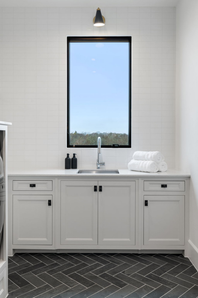 Transitional laundry room photo in Dallas