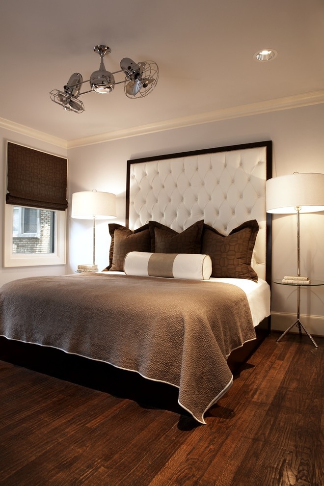 Contemporary bedroom in Dallas with grey walls, dark hardwood floors and brown floor.