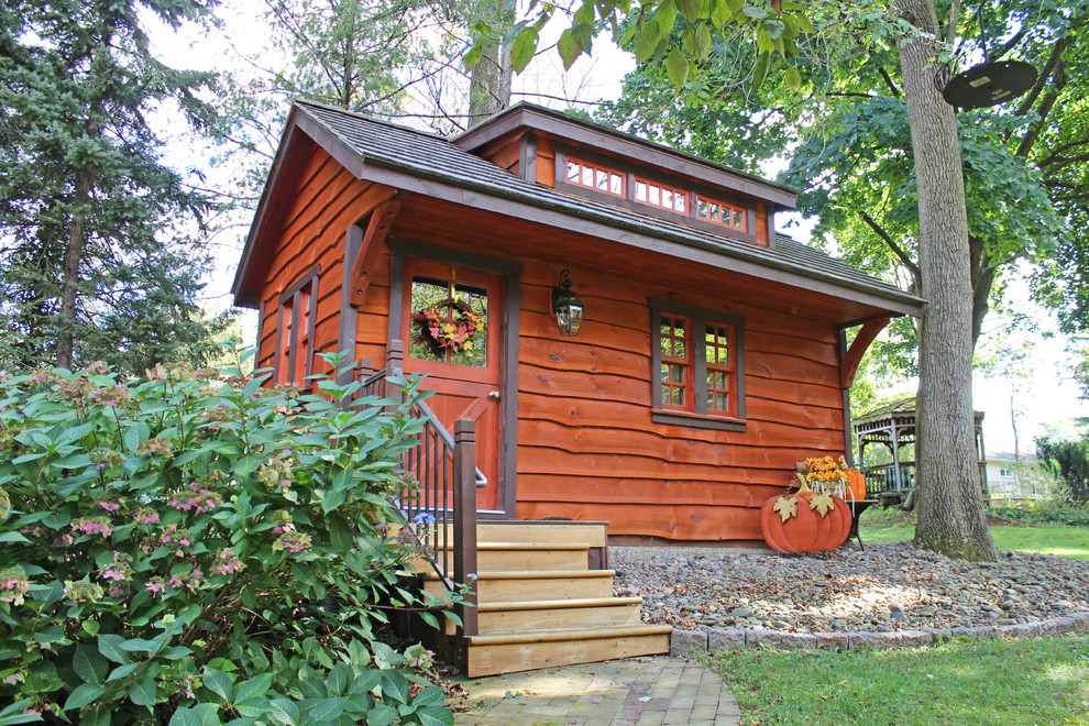 Inspiration for a mid-sized detached garden shed remodel in Other