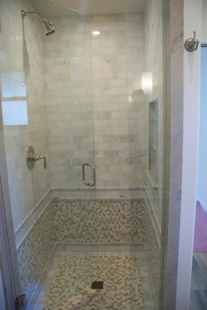 Mid-sized mediterranean 3/4 bathroom in San Diego with an alcove shower, multi-coloured tile and stone tile.