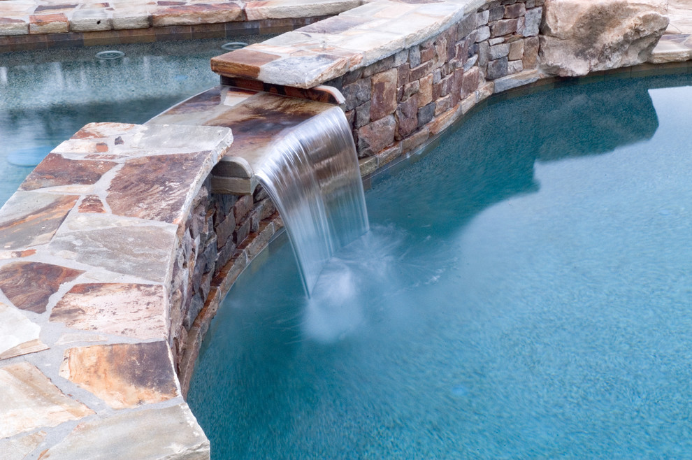 Inspiration for a rustic pool remodel in Atlanta