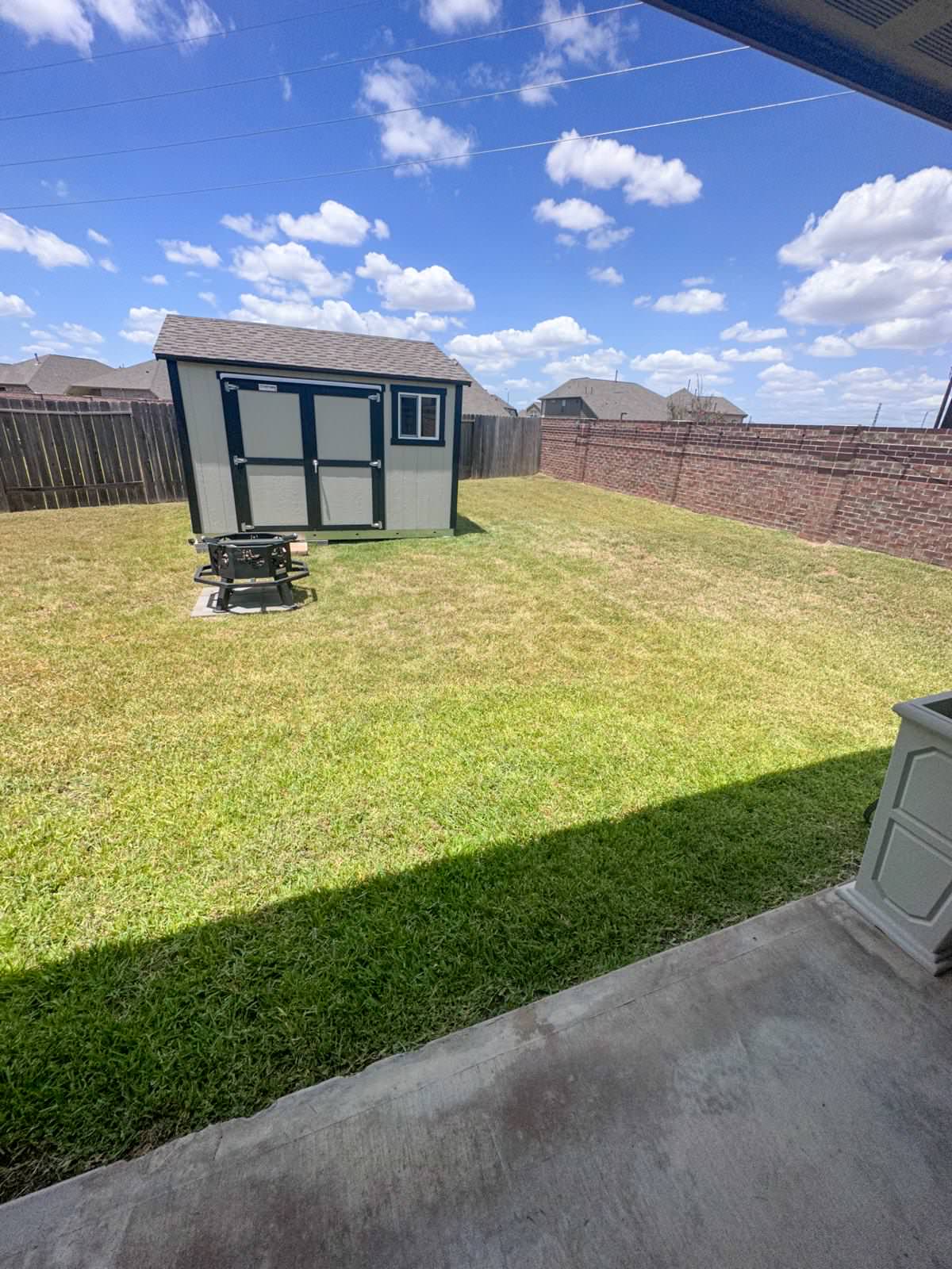 Backyard paver patio with gravel!