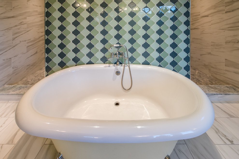 Inspiration for a large transitional master blue tile and marble tile marble floor and gray floor home design remodel in DC Metro with raised-panel cabinets, white cabinets, a two-piece toilet, blue walls, an undermount sink and granite countertops