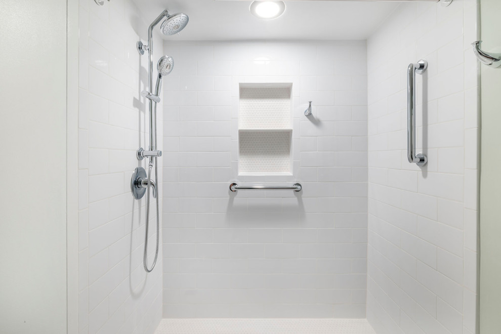 Photo of a small contemporary master bathroom in DC Metro with flat-panel cabinets, dark wood cabinets, a drop-in tub, an open shower, a one-piece toilet, white tile, ceramic tile, green walls, porcelain floors, an integrated sink, solid surface benchtops, beige floor, a shower curtain, white benchtops, a niche, a single vanity and a freestanding vanity.