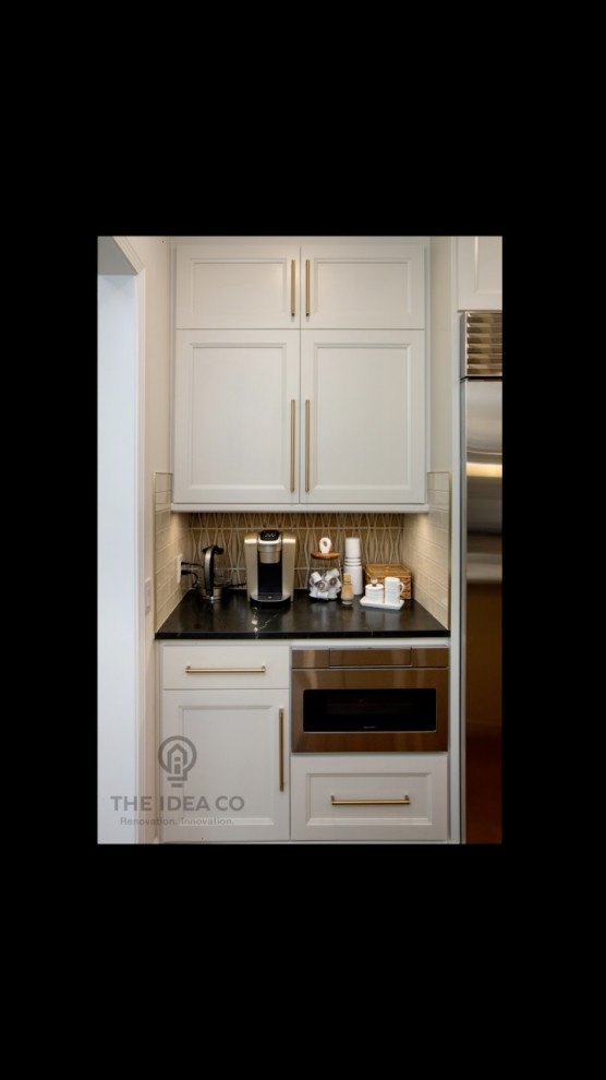 Inspiration for a mid-sized transitional galley light wood floor and brown floor kitchen pantry remodel with a single-bowl sink, recessed-panel cabinets, white cabinets, quartzite countertops, multicolored backsplash, ceramic backsplash, stainless steel appliances, an island and white countertops