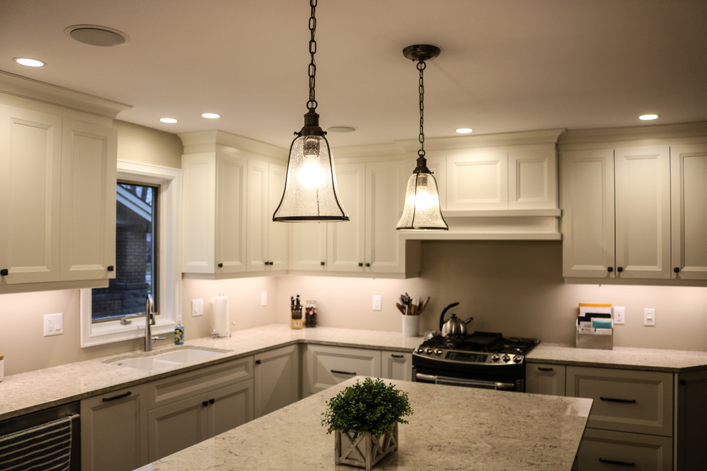 Example of a transitional kitchen design in Toronto