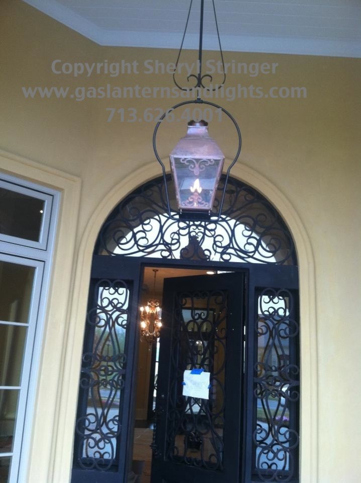 Sheryl's French Style Gas Lantern with Solid Top, Window Pane Scrolls and Hangin