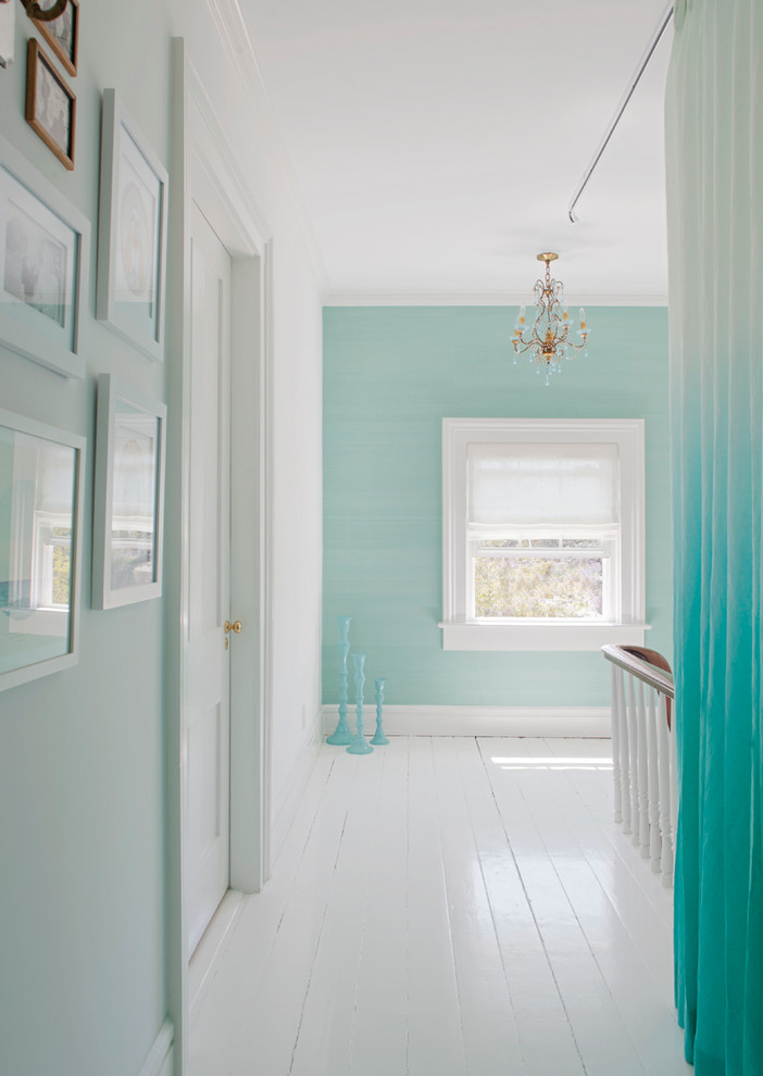 Mid-sized traditional hallway in Atlanta with blue walls, painted wood floors and white floor.