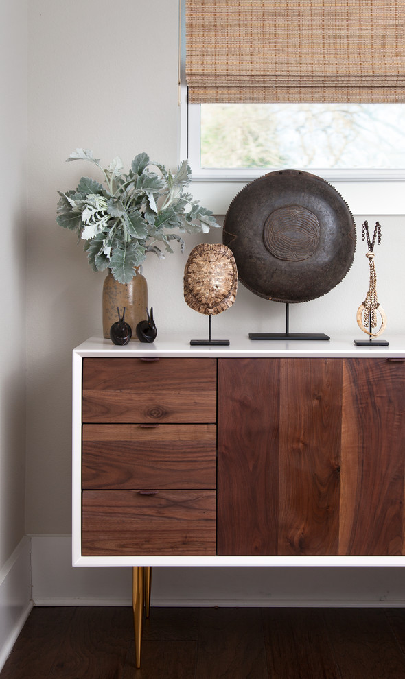 Example of a mid-sized transitional dark wood floor front door design in Austin with gray walls and a black front door