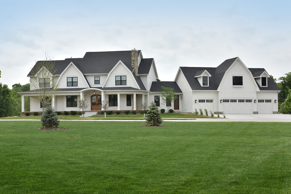 Expansive country home design in Other.