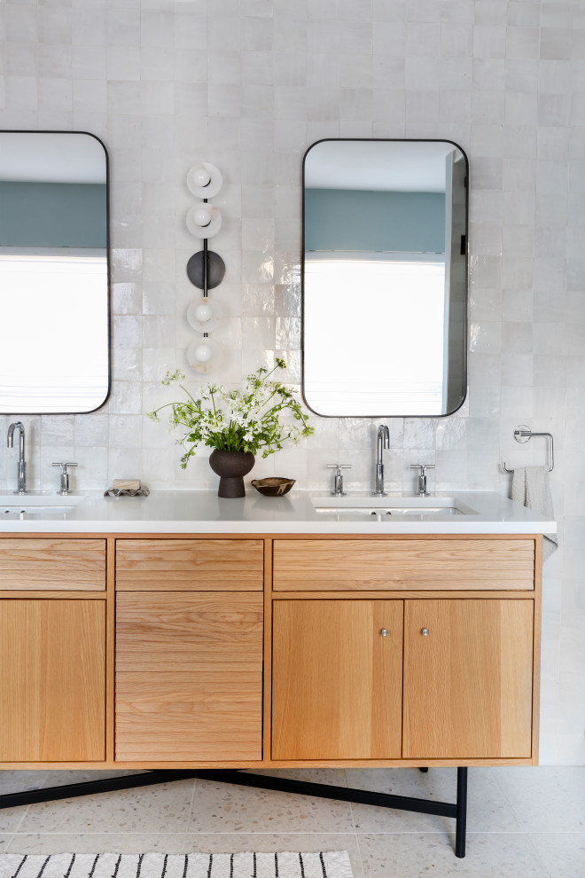 Inspiration for a large eclectic white tile double-sink bathroom remodel in Philadelphia with light wood cabinets, quartz countertops, white countertops and a freestanding vanity
