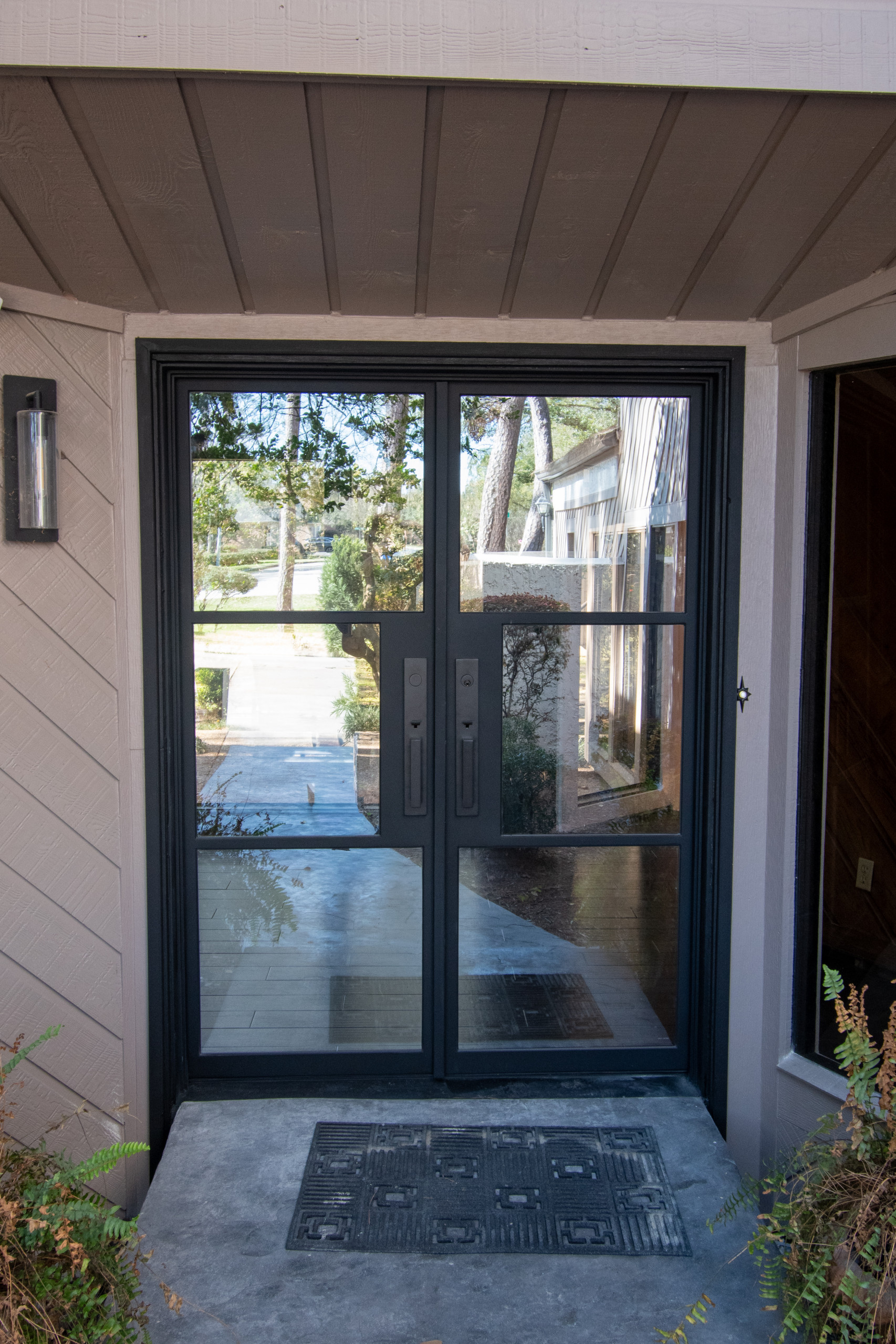 Contemporary Entry Makeover: Iron Door Installation in Tomball & Cypress