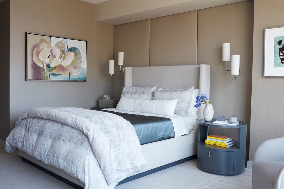 This is an example of a contemporary master bedroom in New York with grey walls, carpet, no fireplace and grey floor.