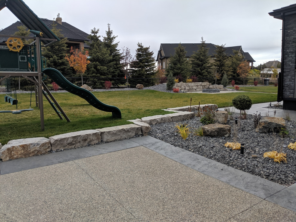 Linear patio and Armour stone retaining wall we built in Edmonton