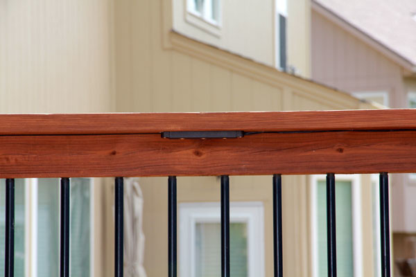 Deck lighting using low under railing LED lights american-traditional-terrace