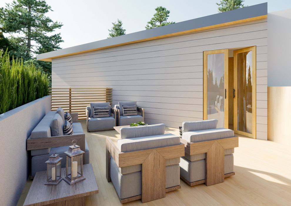 Inspiration for a large modern side yard patio remodel in Los Angeles with decking and no cover