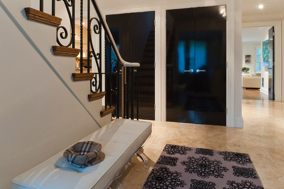 Front Entry with Custom Carpeting and Glossy Plum Closets