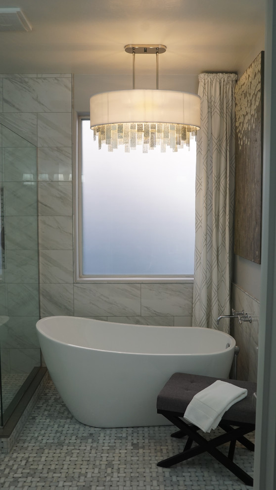 Mid-sized transitional master multicolored tile and porcelain tile mosaic tile floor and multicolored floor freestanding bathtub photo in Phoenix with shaker cabinets, white cabinets, a two-piece toilet, gray walls, an undermount sink, quartzite countertops, a hinged shower door and gray countertops