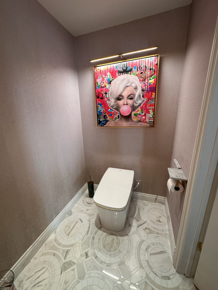 Mid-sized transitional powder room in Los Angeles with furniture-like cabinets, red cabinets, a one-piece toilet, multi-coloured tile, marble benchtops, white benchtops and a built-in vanity.