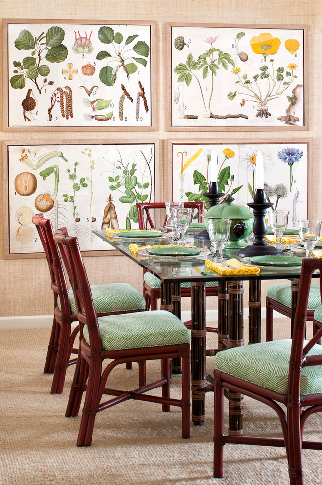 Inspiration for a tropical dining room in New York with beige walls and carpet.