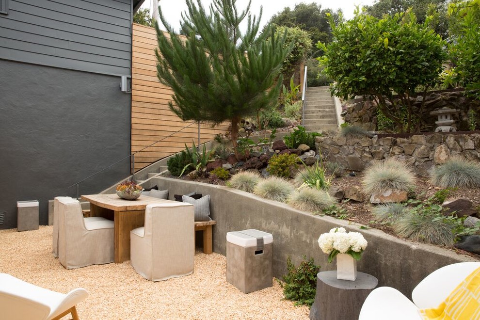 Contemporary backyard patio in San Francisco with gravel, no cover and an outdoor kitchen.