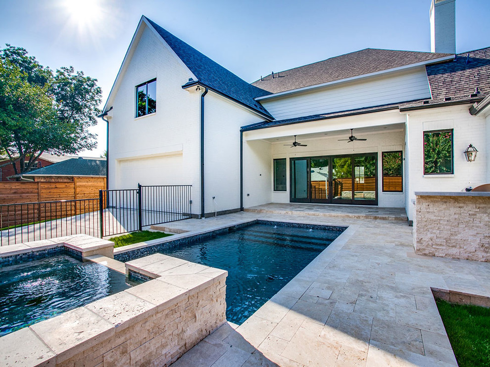 Example of a transitional two-story pool design in Dallas