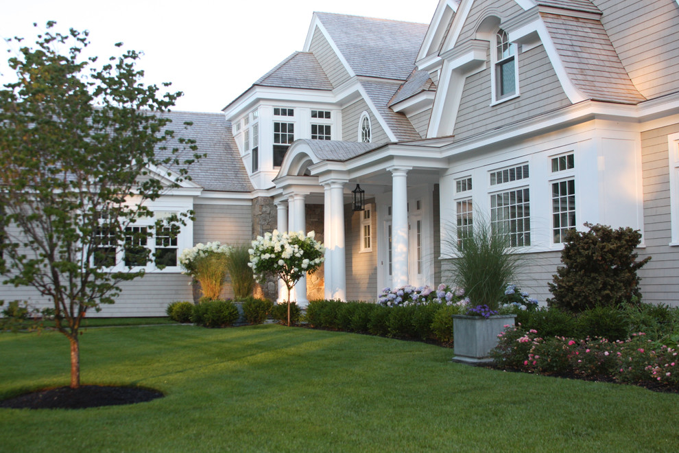 Inspiration for a large transitional front yard partial sun garden in Boston.