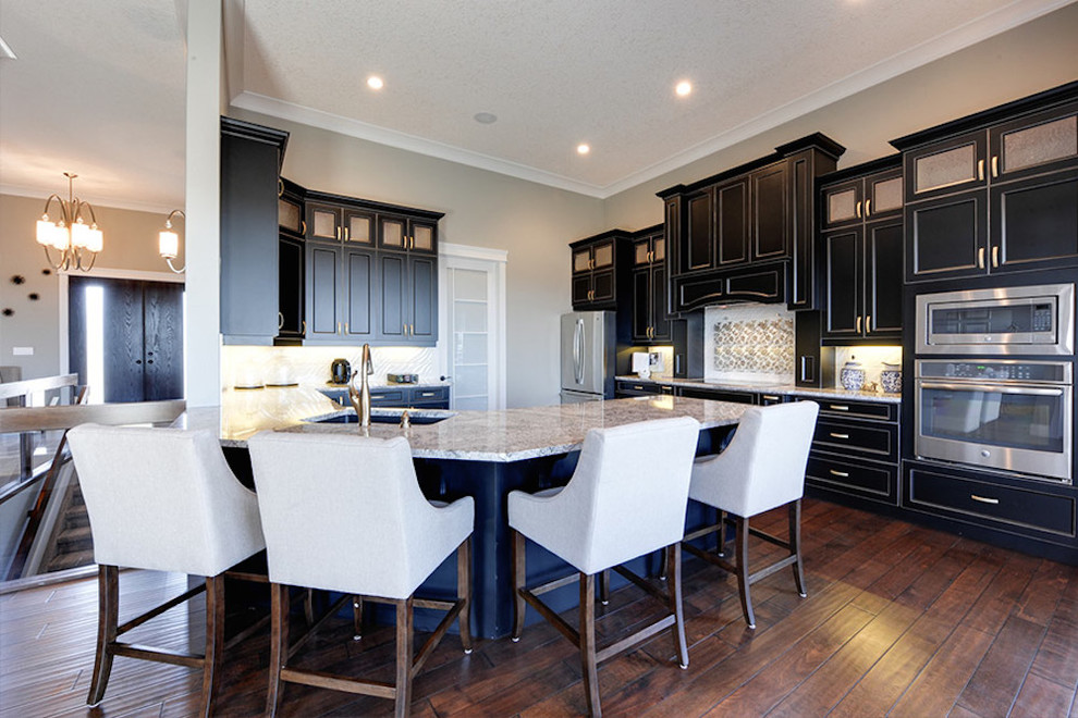 Example of a transitional kitchen design in Edmonton