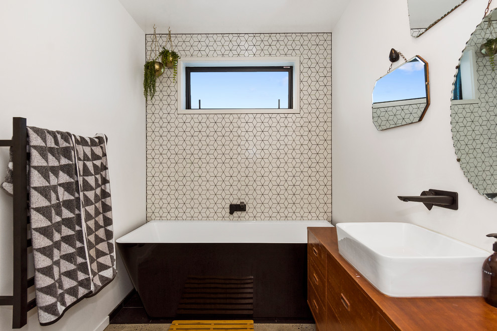 Inspiration for a contemporary bathroom in Other with flat-panel cabinets.
