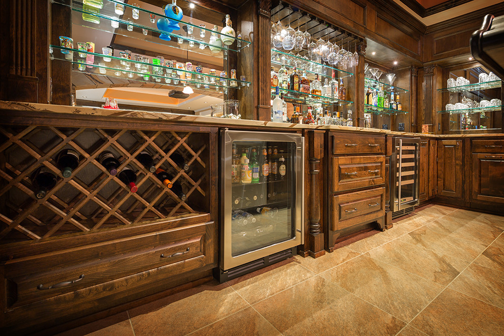 Inspiration for a large traditional home bar in Atlanta.