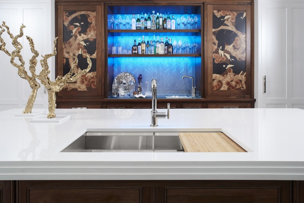 Large transitional galley wet bar in Dallas with an undermount sink, beaded inset cabinets, medium wood cabinets, wood benchtops, grey splashback and metal splashback.