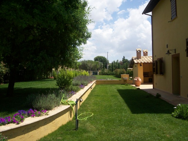 2-Ristrutturazione di un casale in Toscana landhausstil-garten