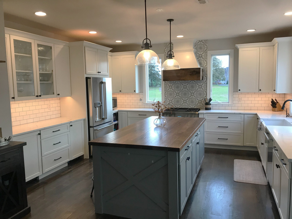 Large country kitchen in Philadelphia with wood benchtops and with island.