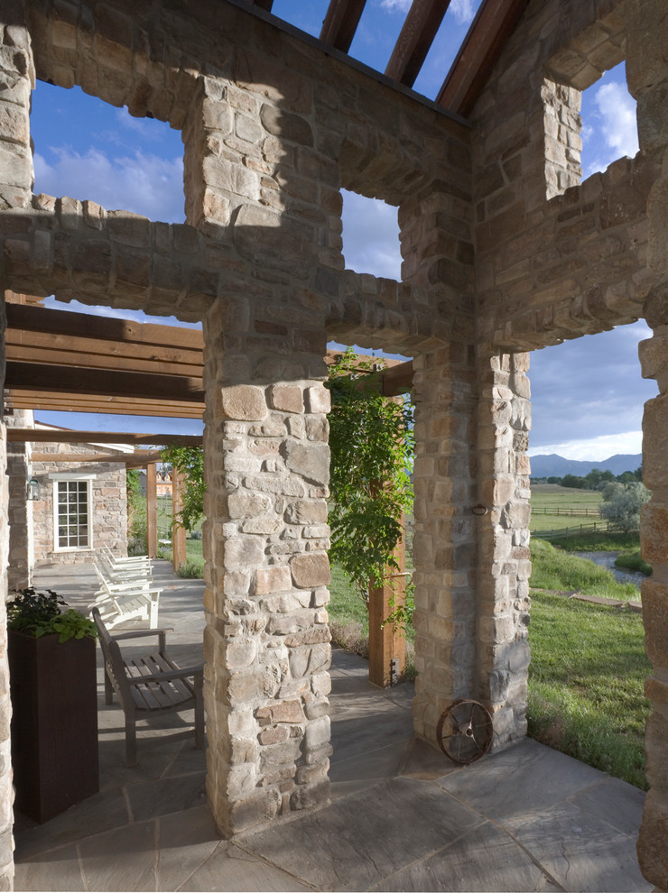 Inspiration for a traditional patio in Denver with a pergola.