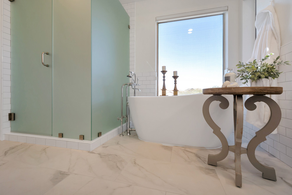 Mid-sized transitional master white tile and subway tile porcelain tile and white floor freestanding bathtub photo in Phoenix with a hinged shower door